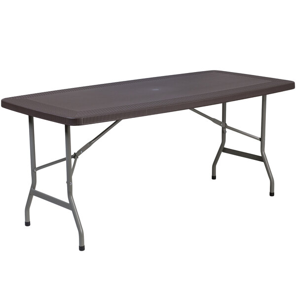 A brown rectangular Flash Furniture plastic folding table with legs.