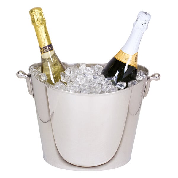 A Franmara Chevalier wine cooler filled with ice and two bottles of champagne.