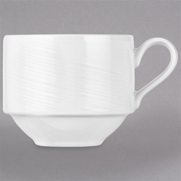 A white porcelain cup with a handle.