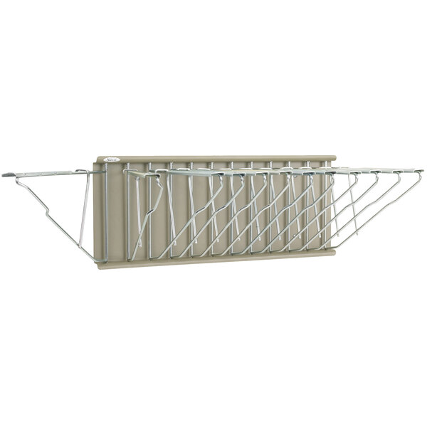 A Safco metal wall rack with 12 metal clamp spaces.