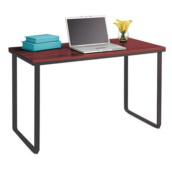 A Safco cherry and black steel workstation with a laptop on it.