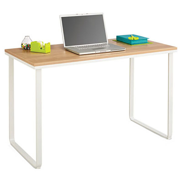 A laptop on a Safco beech and white steel workstation desk.