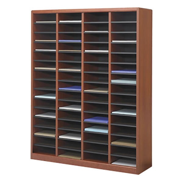 A Safco E-Z Stor wood file organizer with many compartments holding different colored papers.