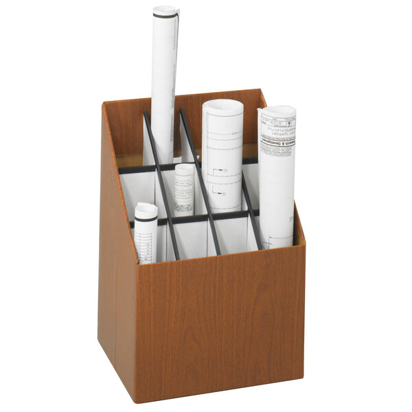 A Safco woodgrain roll file with 12 compartments holding rolls of paper.