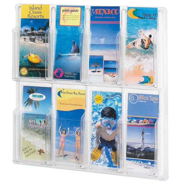 A Safco clear plastic wall-mount display rack with 8 compartments holding brochures.