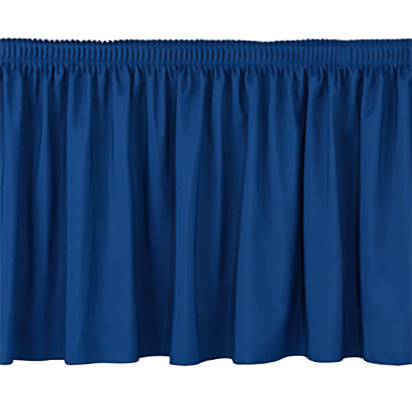 A navy shirred stage skirt with a ruffle on it.