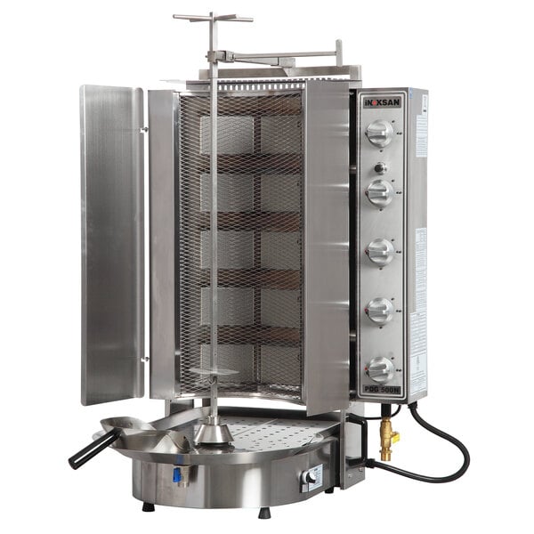 A large stainless steel Inoksan Doner Kebab Machine with a mesh shield over a vertical broiler.