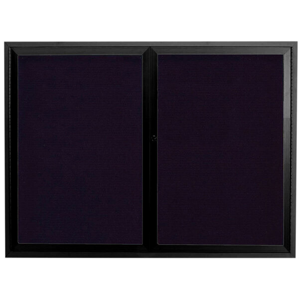 A black rectangular Aarco outdoor directory board with black framed glass doors and black trim.