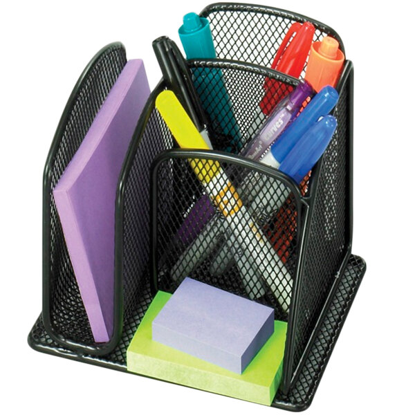 A black metal Safco Onyx desktop organizer with pens and sticky notes in it.