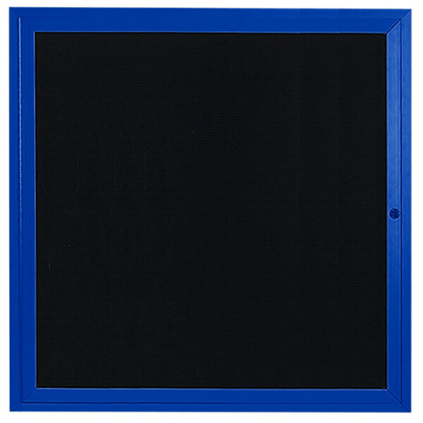 A blue square bulletin board with a black letter board inside.