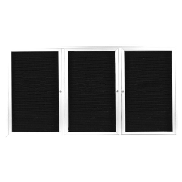A white rectangular outdoor directory board with three black doors and white frames.