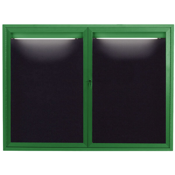 A black rectangular message center with a green border and black letter board inside a green window.