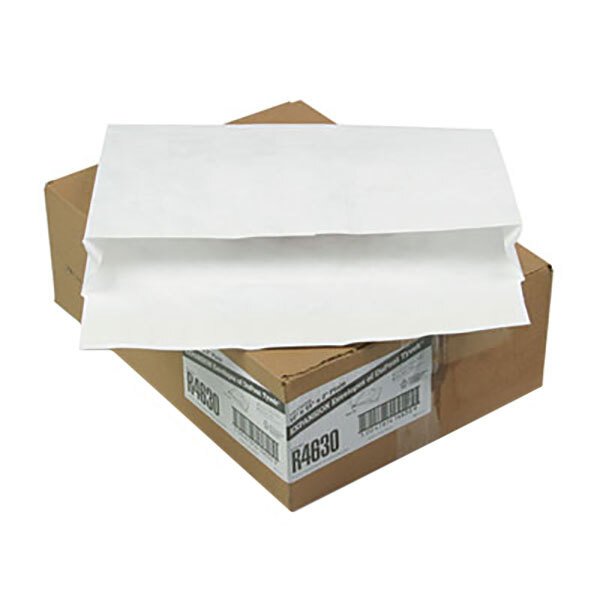 A brown box with a white Survivor Tyvek expansion mailer on top.