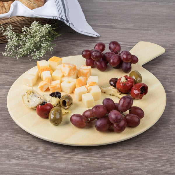 A GET faux birch wood melamine display board with cheese and grapes.