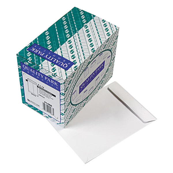A box with white Quality Park file envelopes with a green stripe on the label.