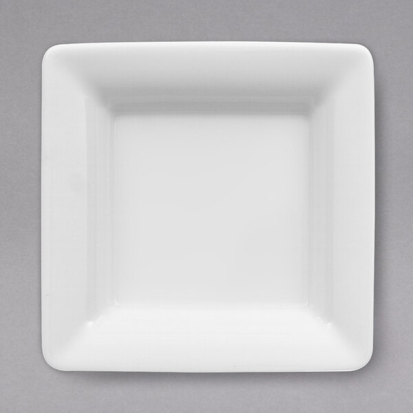 A white square bowl with a black border.