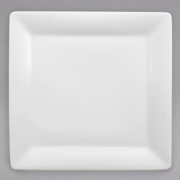 A white Villeroy & Boch square porcelain plate with a white rim.