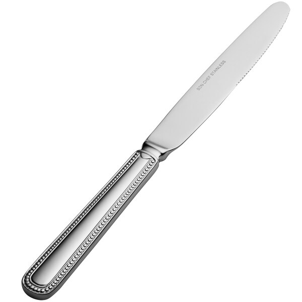 A silver Bon Chef European dinner knife with a solid handle.