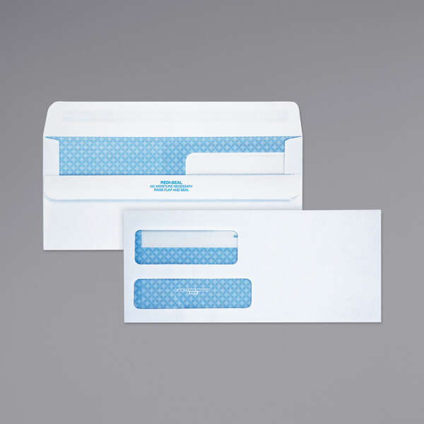 A white Quality Park business envelope with 2 windows.