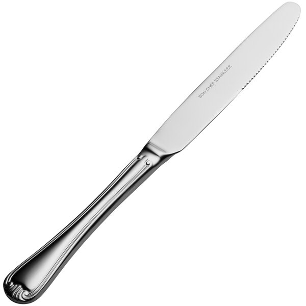 A silver knife with a solid handle.