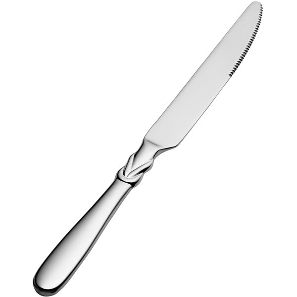 A Bon Chef stainless steel dinner knife with a solid silver handle and blade.