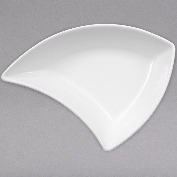 A Villeroy & Boch white porcelain bowl with a curved edge.