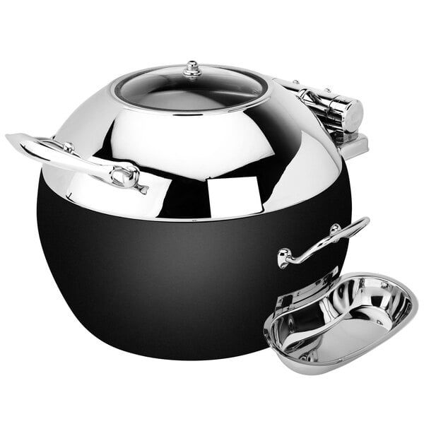 A stainless steel Eastern Tabletop Crown soup chafer with a black base and hinged glass dome cover.