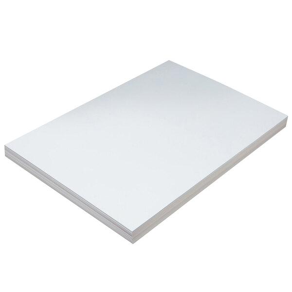 A stack of white Pacon Medium Weight Tagboards.