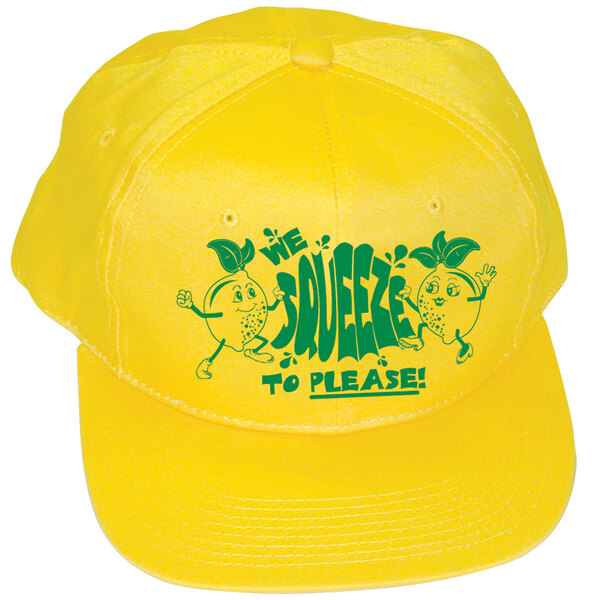 A yellow baseball cap with green text reading "We Squeeze to Please"