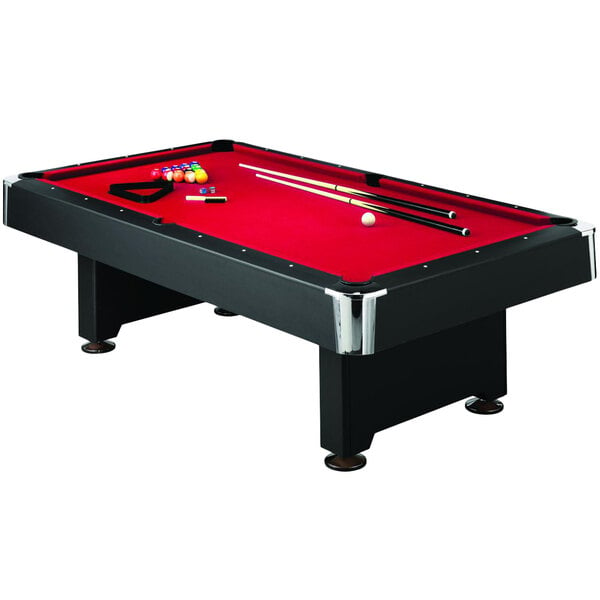 A red Mizerak pool table with a black base set up with cue sticks and balls.