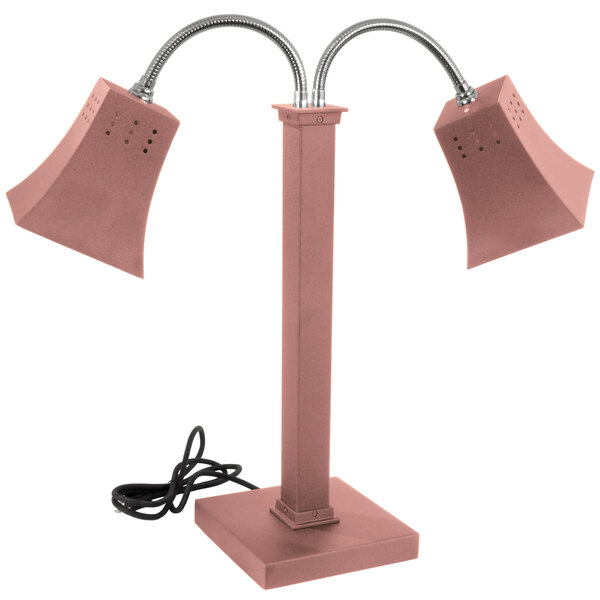 A copper freestanding double arm heat lamp with square shades and adjustable necks.