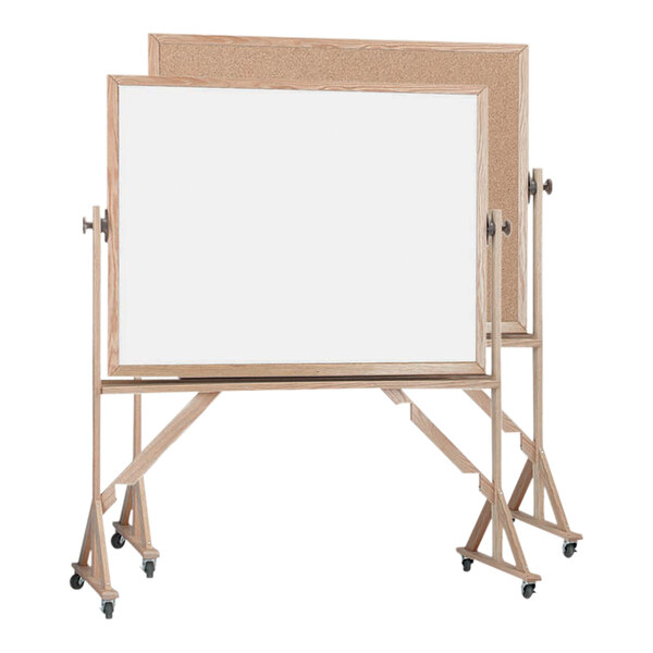 Aarco WRBC4260 60" x 42" Reversible Free Standing White Melamine Markerboard / Natural Cork Board with Solid Oak Wood Frame