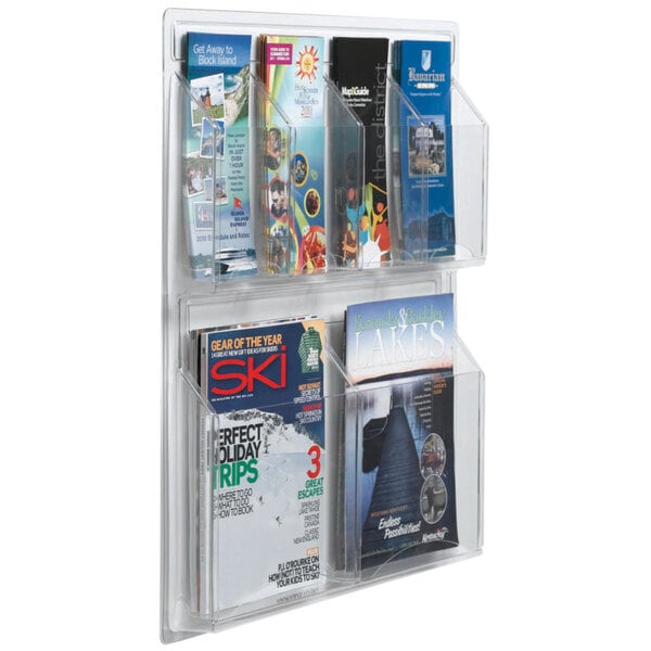 An Aarco clear magazine rack with 2 magazines and 4 pamphlets.