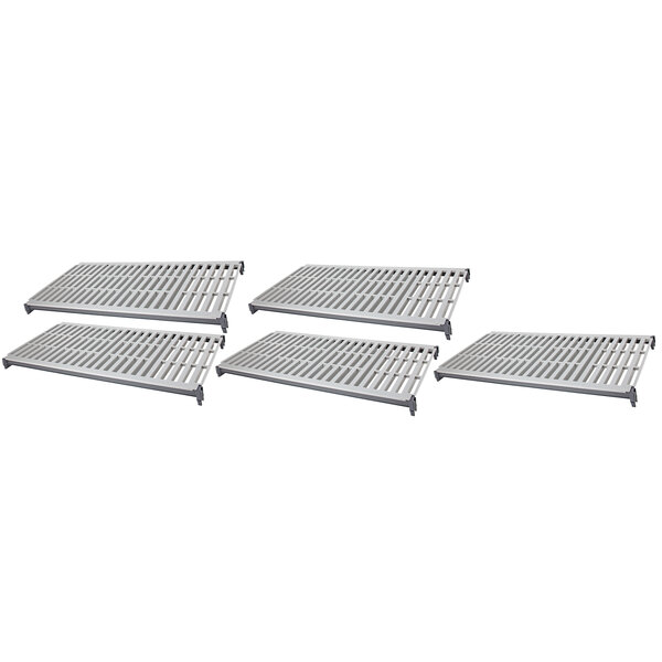 A white metal grate with holes for a Cambro Camshelving Basics Plus shelf kit.
