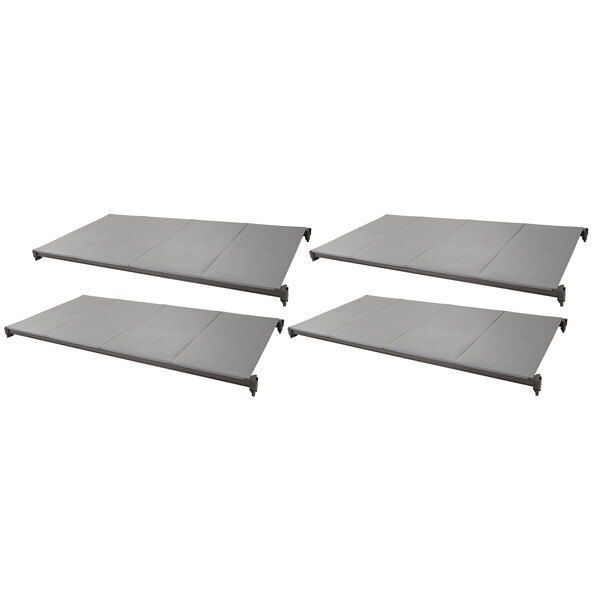 A group of grey metal shelves.