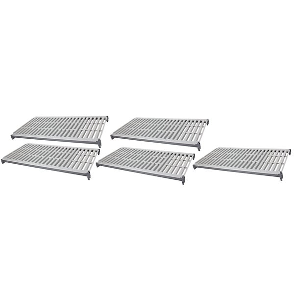 A white metal grate with holes for a Cambro Camshelving Basics Plus shelf.