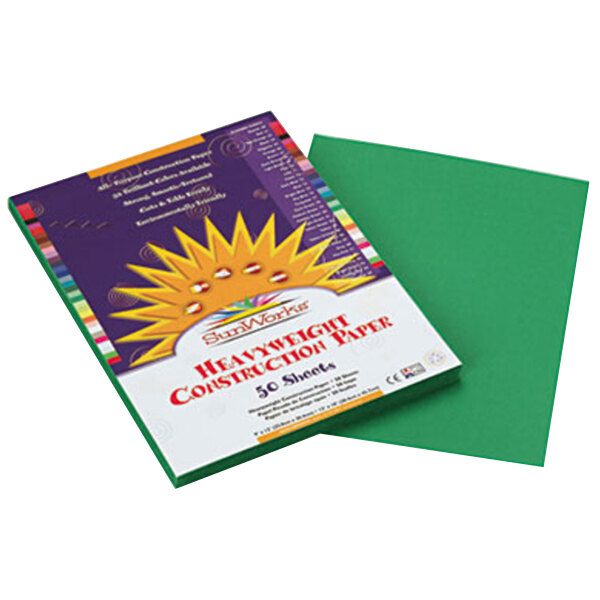 SunWorks holiday green construction paper with a white sun and text on it.