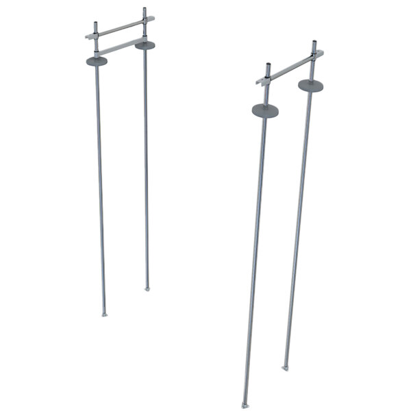 A pair of metal poles with a metal bar on top.