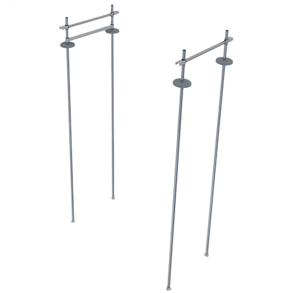 A pair of metal poles with metal bars on top.