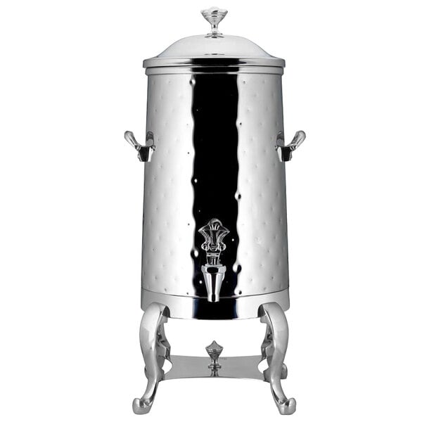 A silver metal coffee chafer urn with a lid.