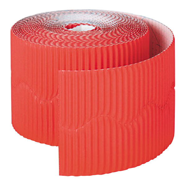 A roll of flame red corrugated paper tape.