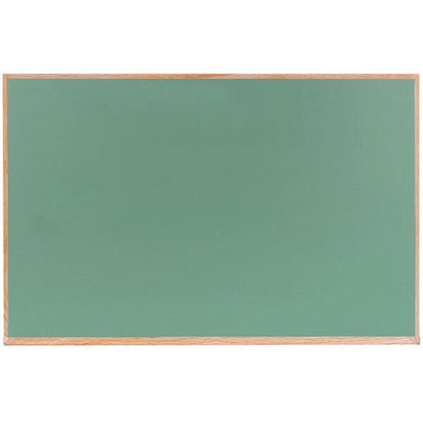 A green chalkboard with a wooden frame.