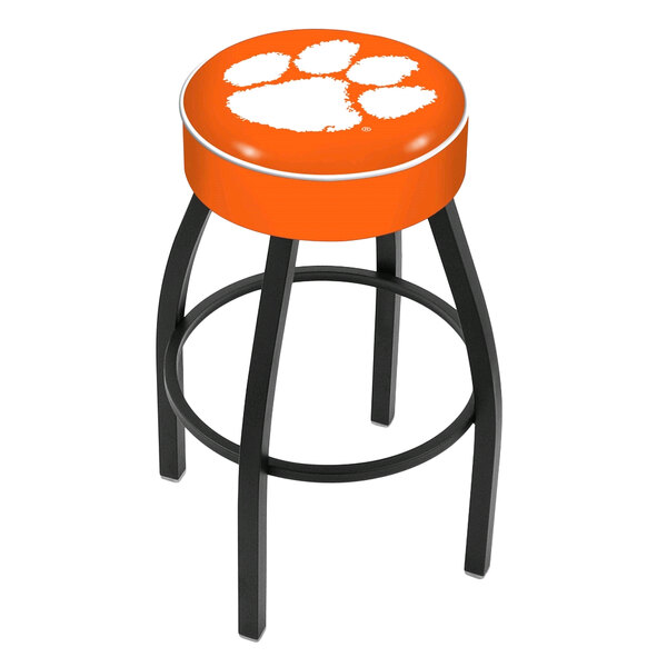 An orange Holland Bar Stool with Clemson paw print on the seat.