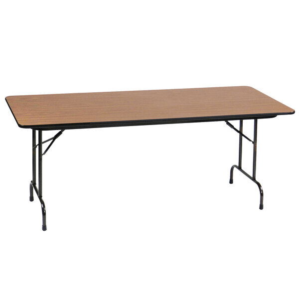 A Correll rectangular medium oak folding table with black metal legs.
