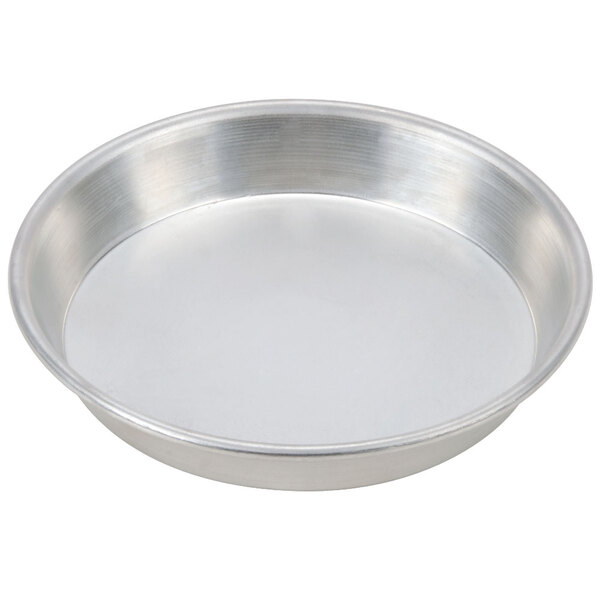 An American Metalcraft silver tin-plated steel deep dish pizza pan with a white background.