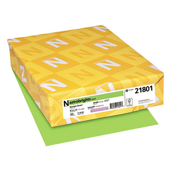 A yellow box of Astrobrights Martian Green paper with white letters.