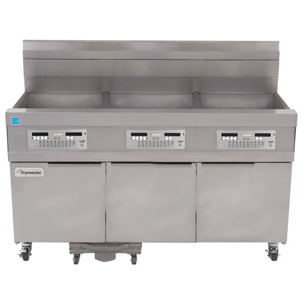 A Frymaster liquid propane floor fryer system with three drawers and two doors.