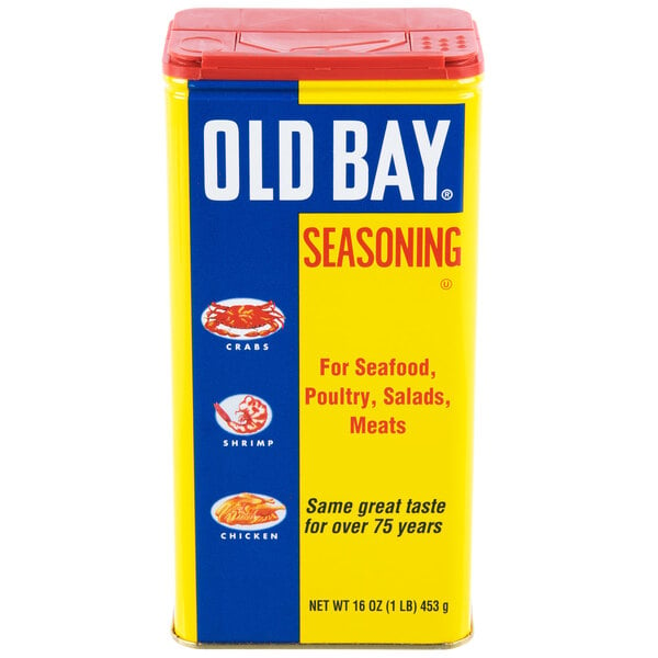 A case of 12 yellow and blue Old Bay seasoning containers with red lids.