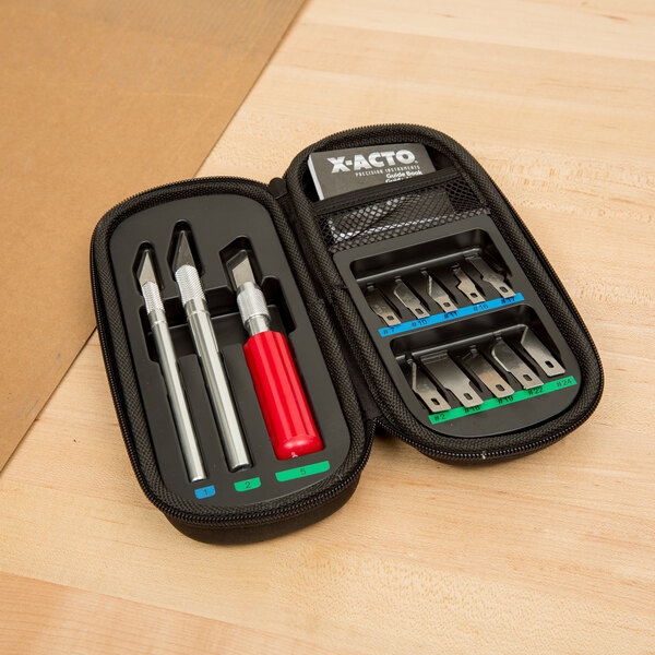 A black case with a X-Acto knife set inside.
