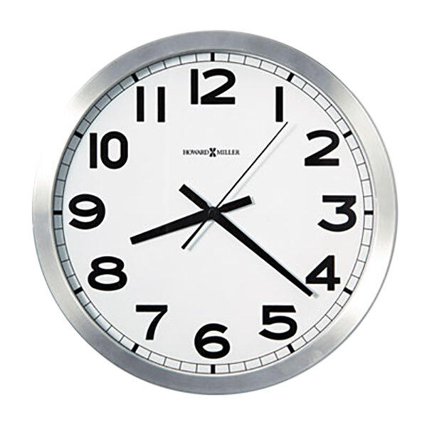 A Howard Miller wall clock with a white face and black numbers.